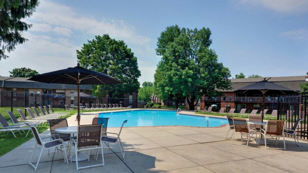 Exterior pool and patio at an apartment community